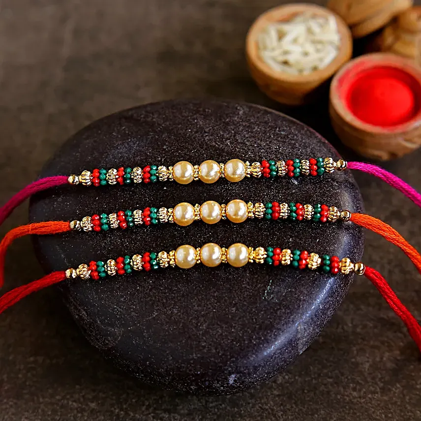 Beautiful Pearl And Mauli Rakhis Set Of 3