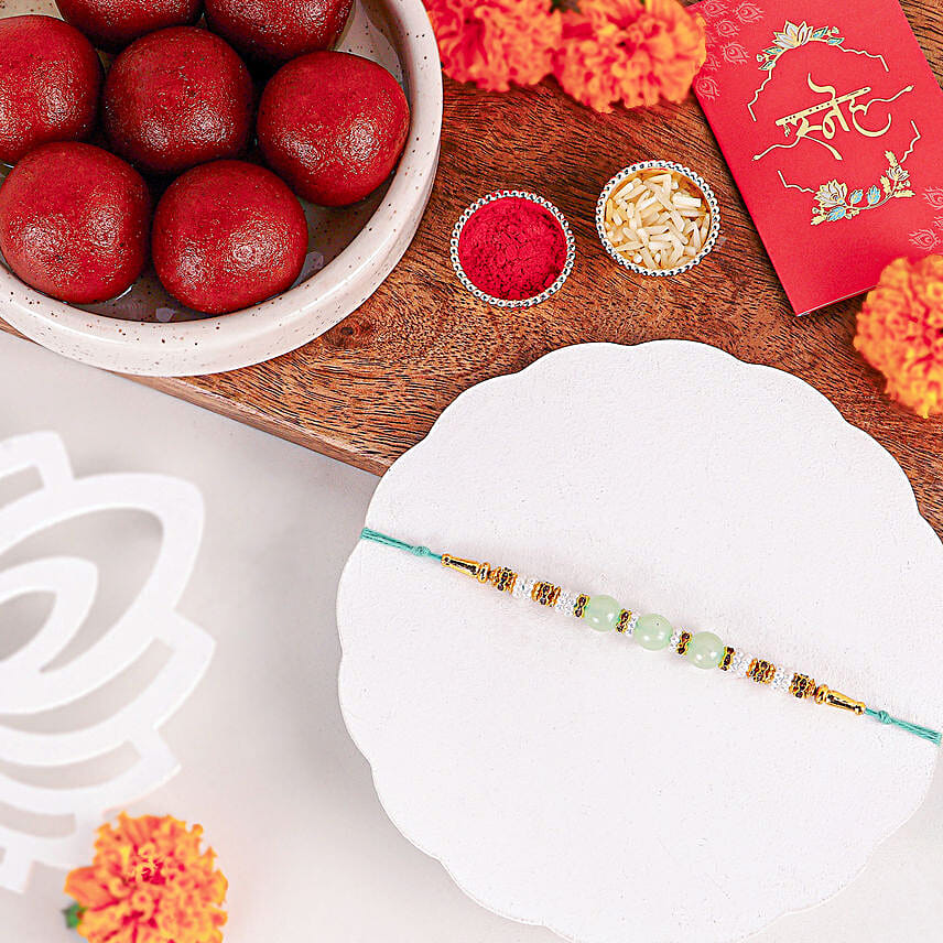 Graceful Pearl Ethnic Rakhi N Gulab Jamun Delight