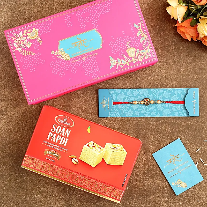 Lion Face Pearl Rakhi And Soan Papdi