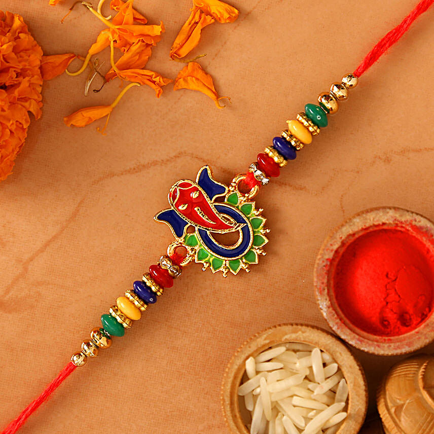 Multicoloured Lord Ganesha Rakhi And Lindt