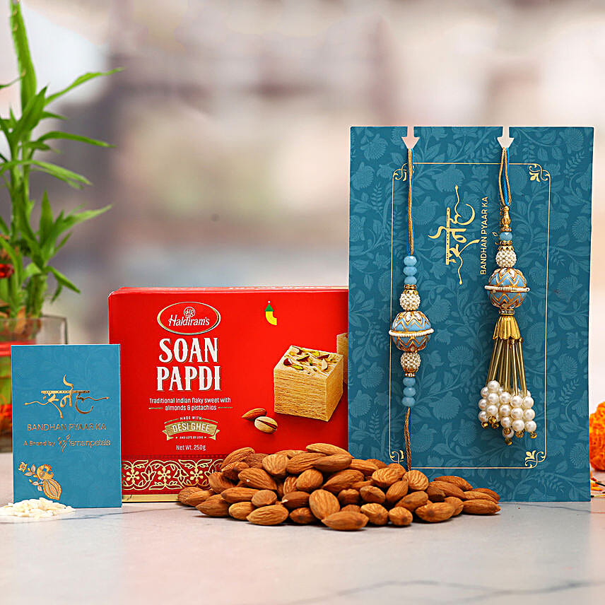 Orb Pearl Lumba Rakhi Set And Almonds With Soan Papdi