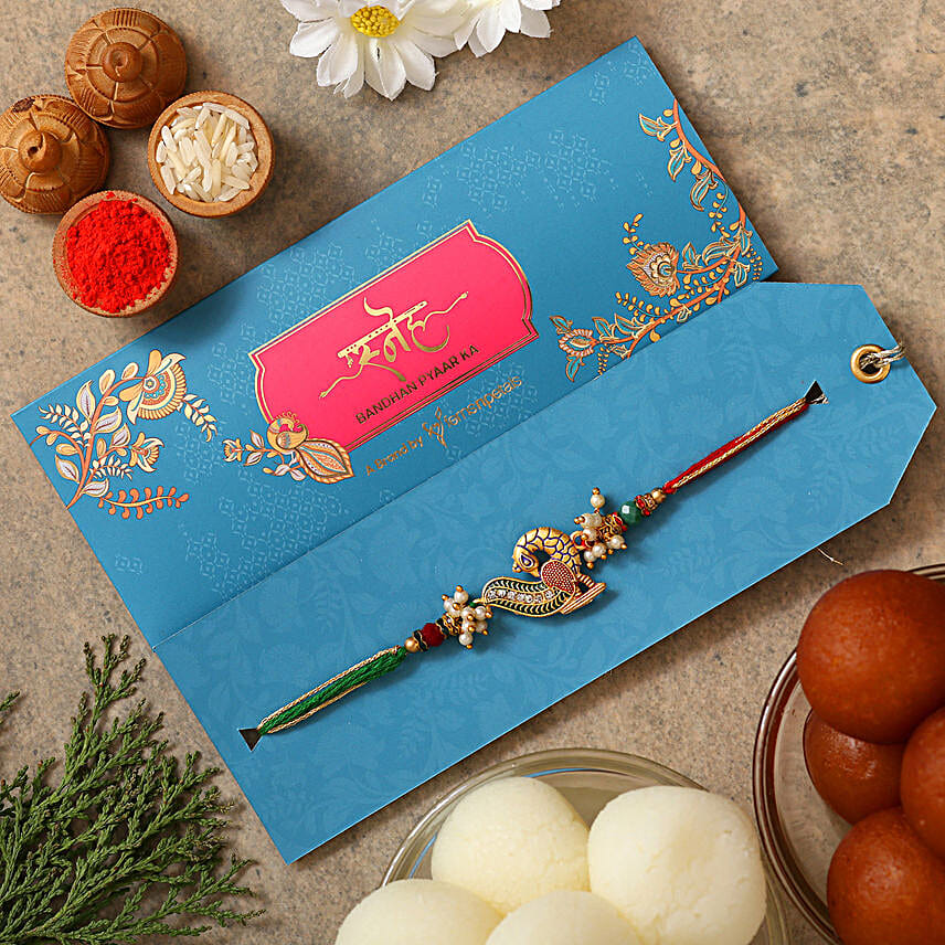 Peacock Designer Rakhi With Gulabjamun And Rasgulla