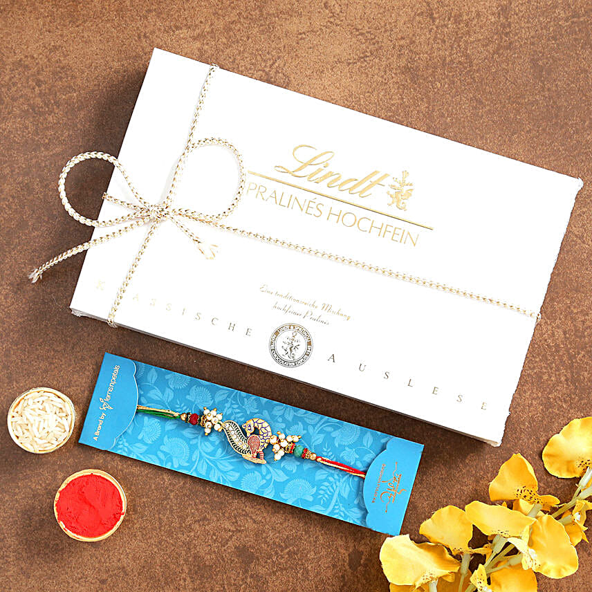 Peacock Rakhi And Lindt Chocolates