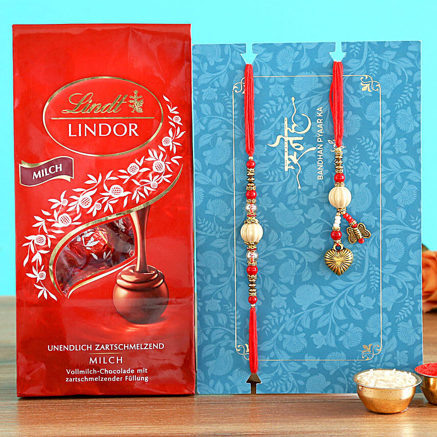 Red Lumba Rakhi Set And Lindt Lindor Milch Chocolates
