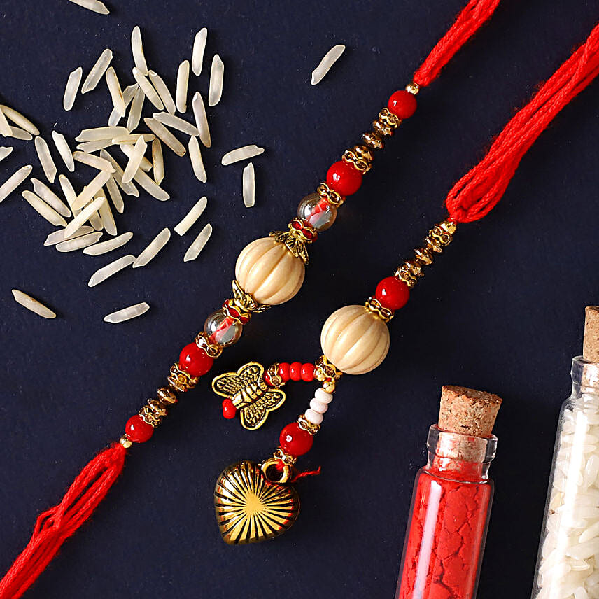 Red Pearl And Lumba Rakhi Set With 250 Gms Soan Papdi