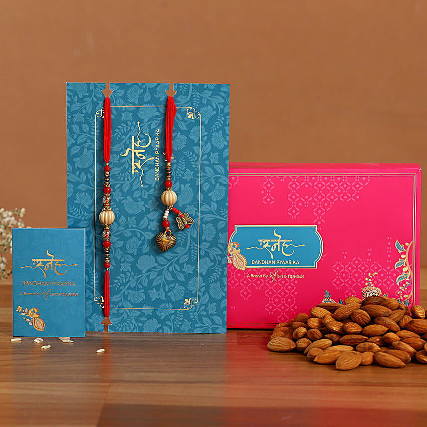 Red Pearl And Lumba Rakhi Set With Healthy Almonds