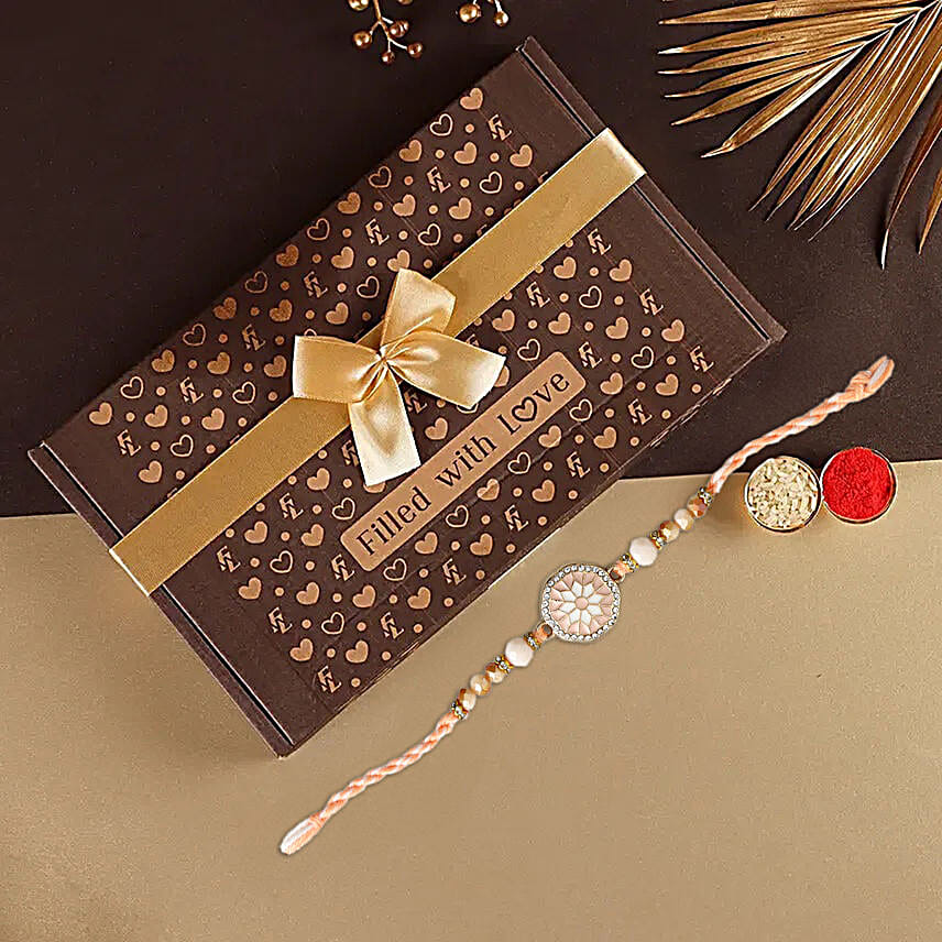Rosy American Diamond Rakhi N Tempting Bonbons Gift Box