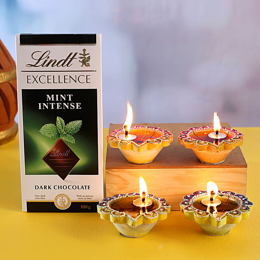 Set Of 4 Designer Diyas And Lindt Mint Intense Dark