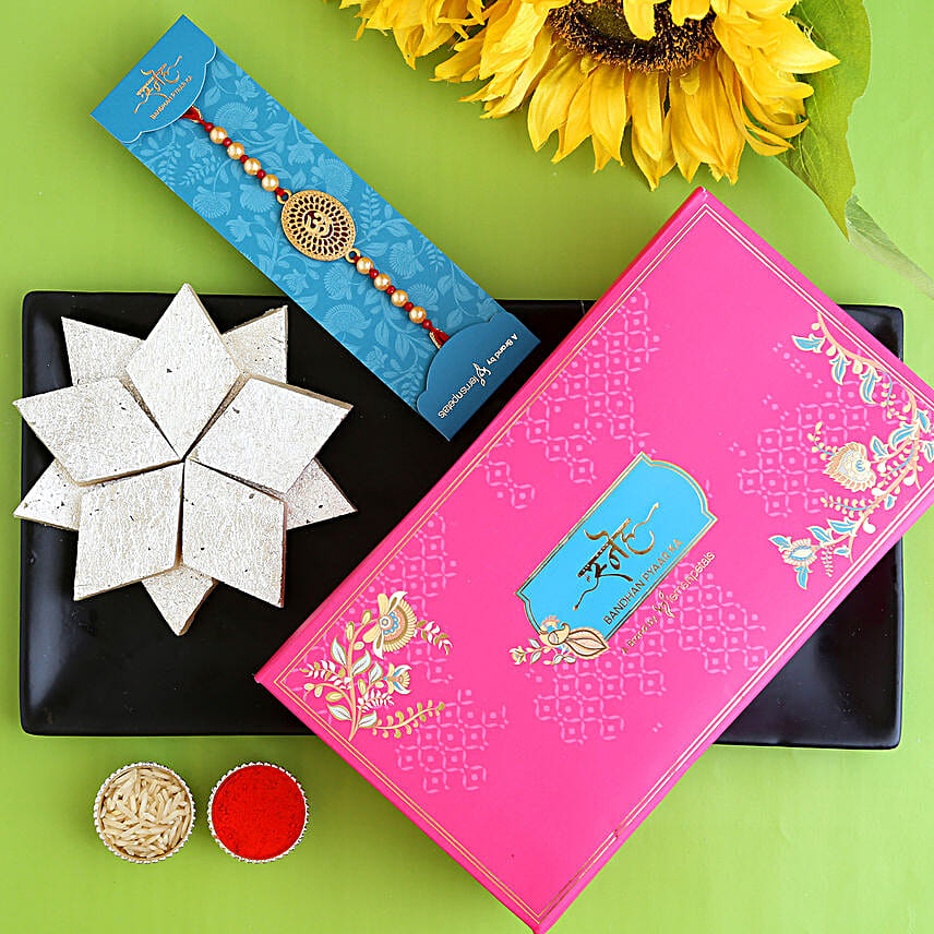 Spiritual Om Pearl Rakhi With 340 Gms Kaju Katli