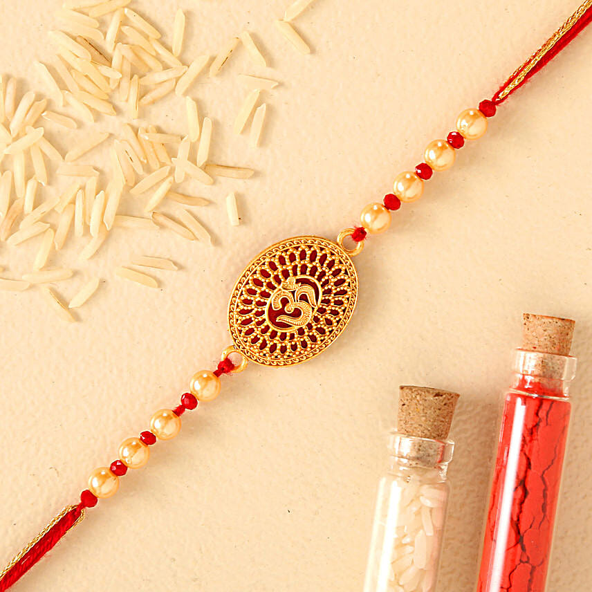 Spiritual Om Pearl Rakhi With 340 Gms Kaju Katli