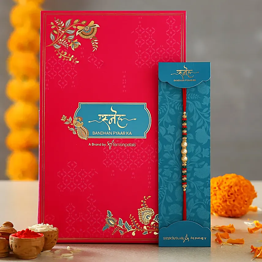 Traditional Pearl Studded Mauli Rakhi