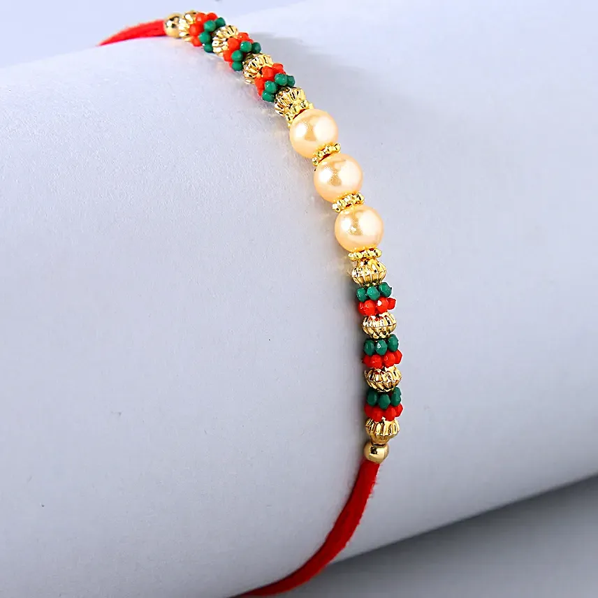 Traditional Pearl Studded Mauli Rakhi