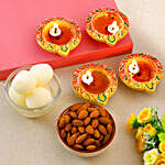 Decorative Diwali Diyas With Almonds And Rasgulla
