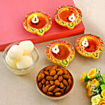 Decorative Diwali Diyas With Almonds And Rasgulla