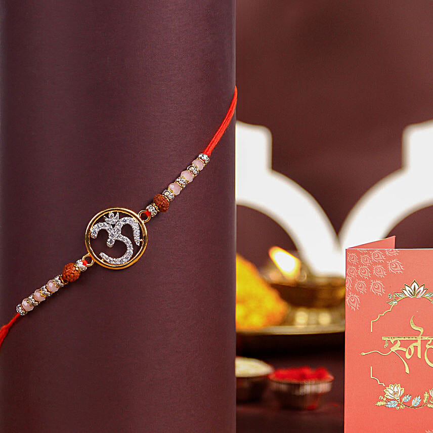 Eternal Glow Om Rakhi N Sweetness Set
