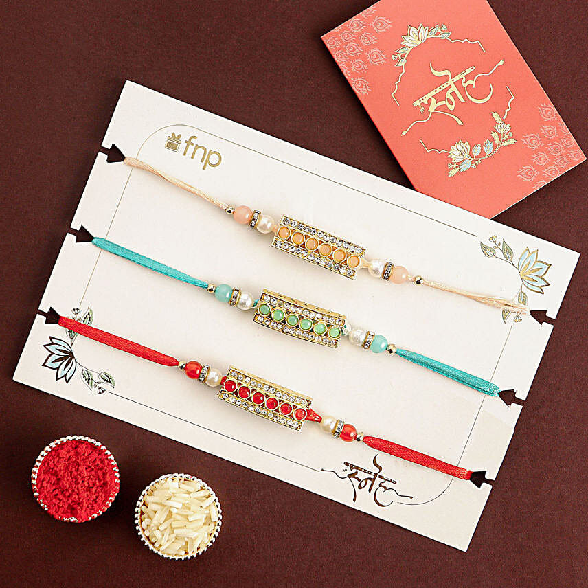 Sparkling Gemstone Trio Rakhi Set N Rasggulla Delight