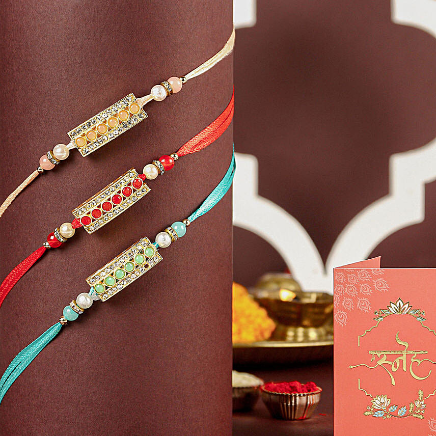 Sparkling Gemstone Trio Rakhi Set N Rasggulla Delight