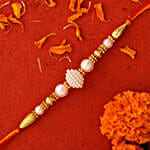 White Pearl Rakhi And Beautiful Cushion