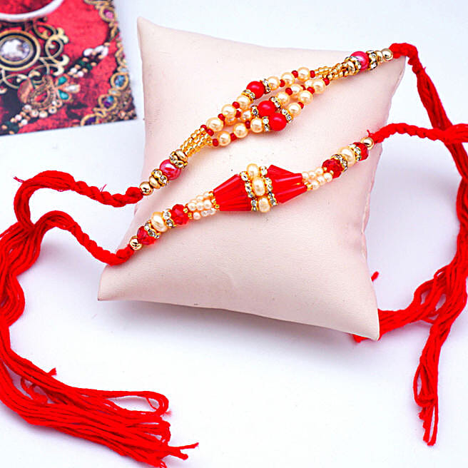 Red And White Rakhi Set indonesia | Gift Red And White Rakhi Set- FNP