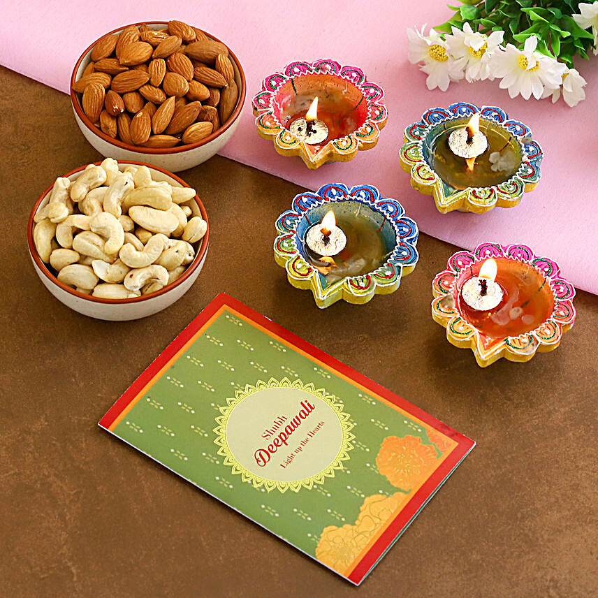 Diyas With Greeting Card And Dry Fruits