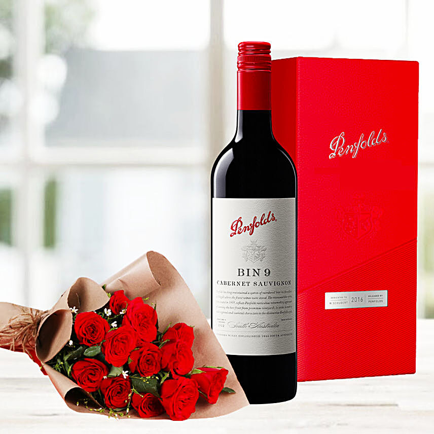 Red Roses Bouquet And Red Wine