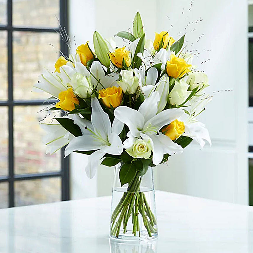 Lovely Lilies And Yellow Roses:Condolence Flowers to Indonesia