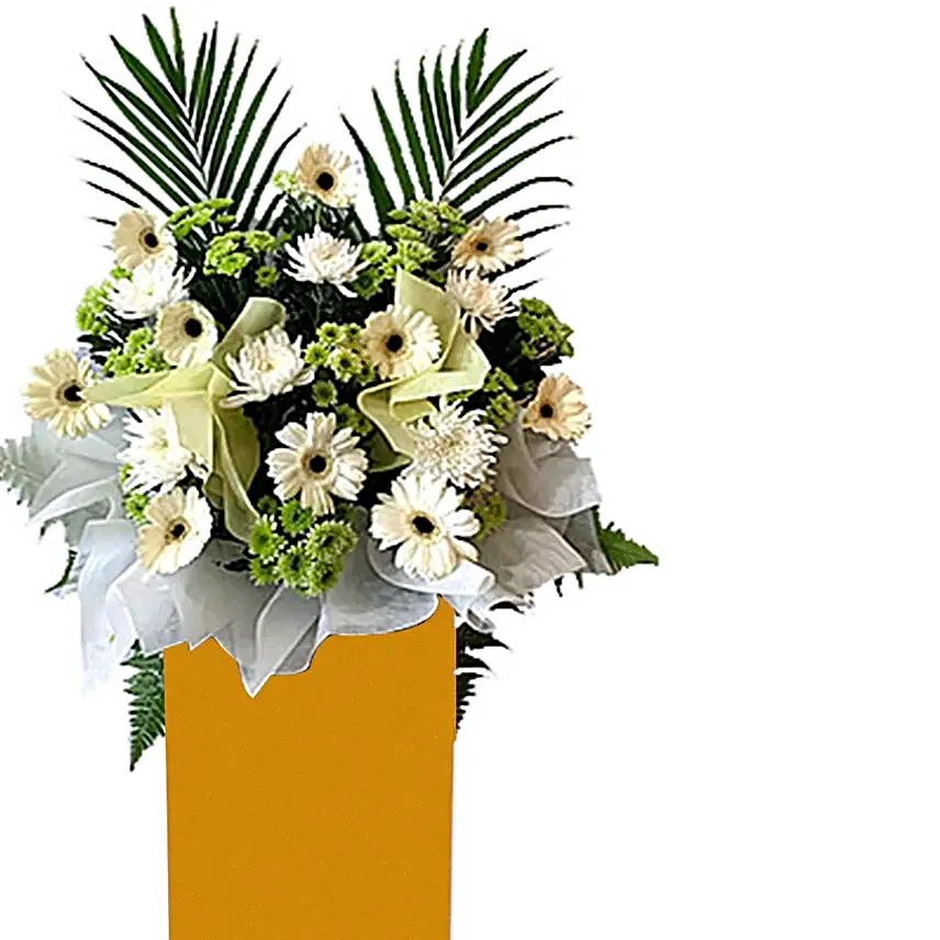 Alluring Mixed Flowers Arrangement In Brown Stand