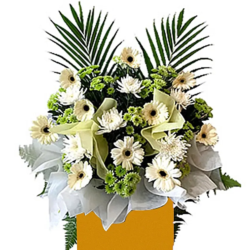 Alluring Mixed Flowers Arrangement In Brown Stand