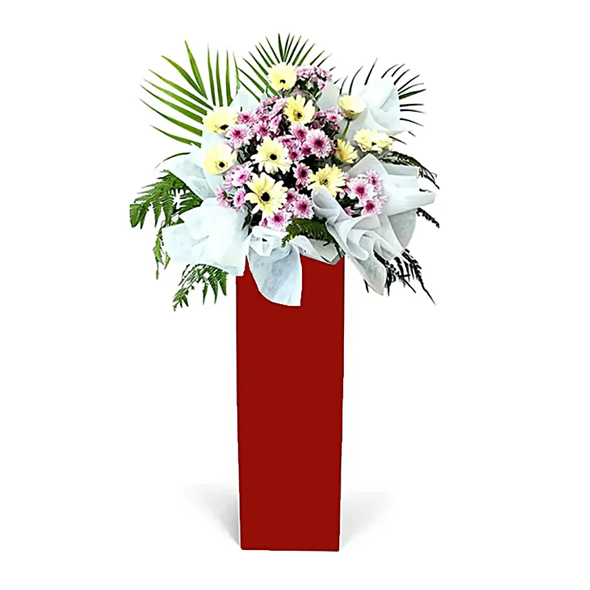 Gerberas Purple Pom In Beautiful Red Stand