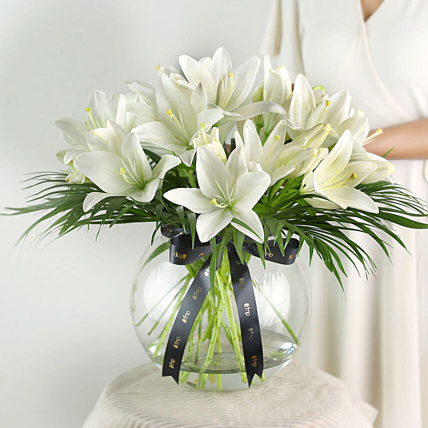 Pure White Asiatic Lilies In Fishbowl Vase