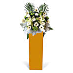 Alluring Mixed Flowers Arrangement In Brown Stand