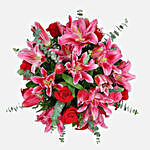 Mixed Roses Stargazer Lilies In Glass Vase Arrangement