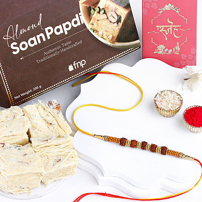 Celestial Charms Rudraksha Rakhi N Almond Soan Papdi Gift Set