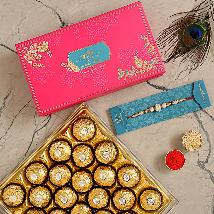 Elegant Pearl Mauli Rakhi And 16 Pcs Ferrero Rocher:Single Rakhi Delivery in Kuwait