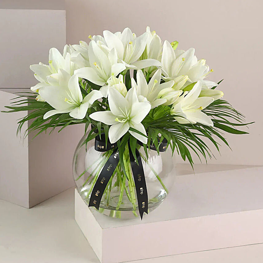 Pure White Color Asiatic Lilies In Fishbowl Vase