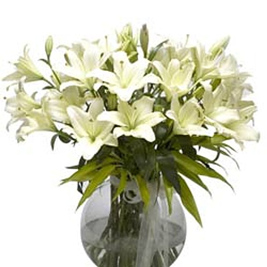Refined Beauty - Arrangement of 15 white lilies in a glass vase.