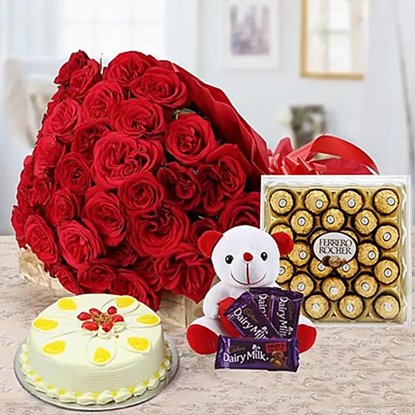 Tower Of Love - Bunch of 40 Red roses with chocolates, Soft toy, 300gm Ferrero rocher chocolate box, 500gm Butter Scotch cake.