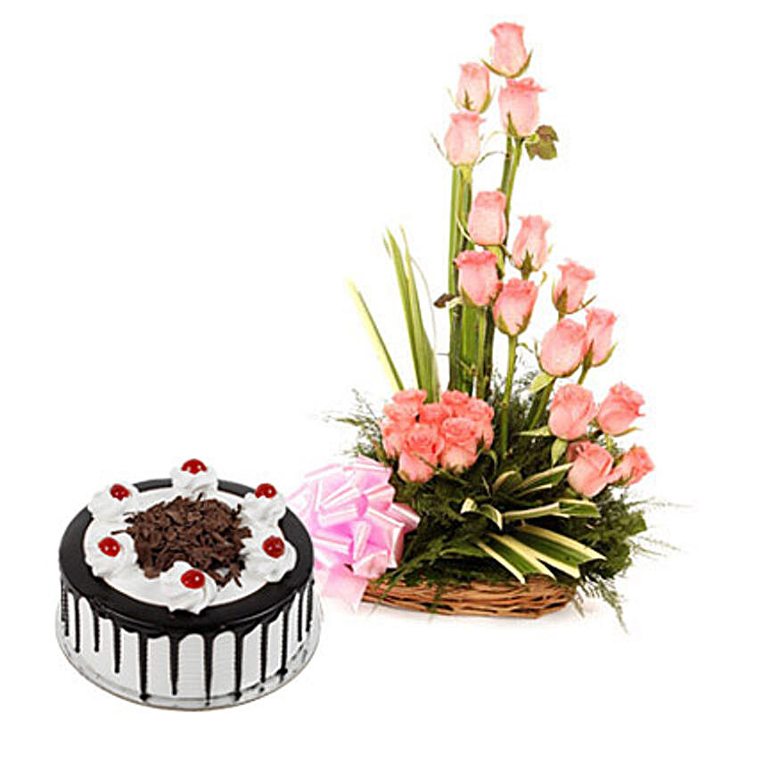 Pink Roses N Chocolate Treat - Basket arrangement of 20 Pink roses and half kg balckforest cake.