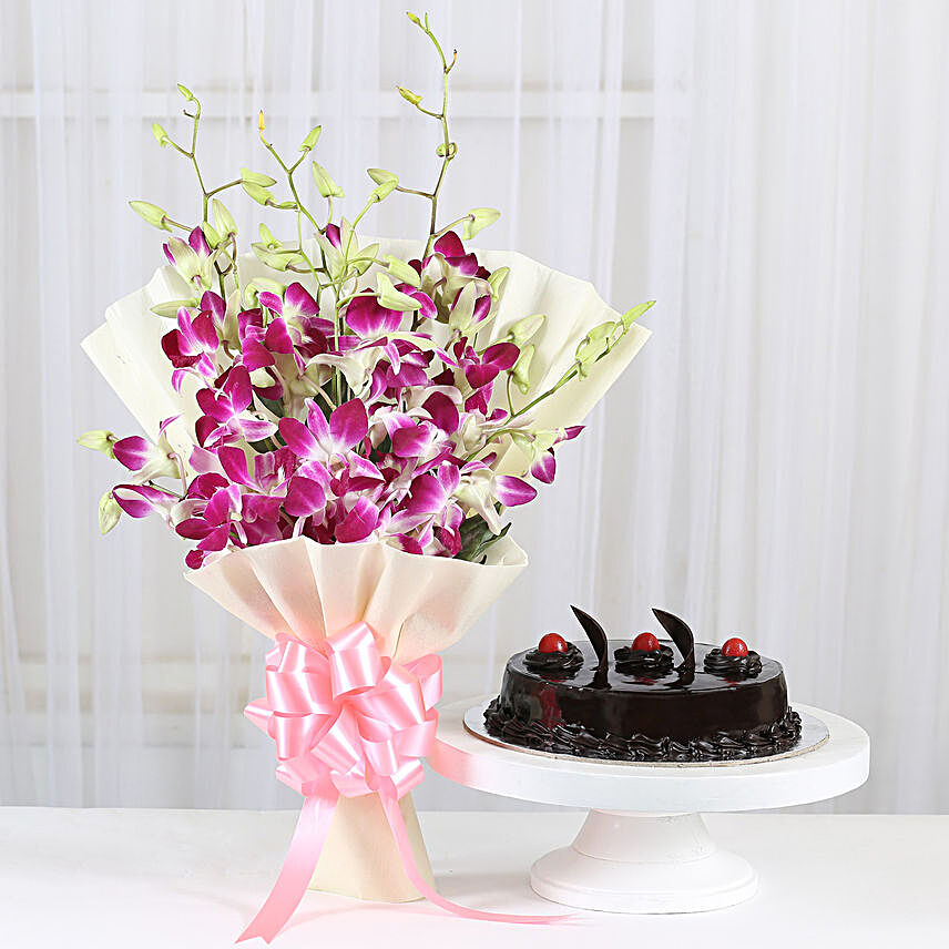 Blue orchids bouquet with cake