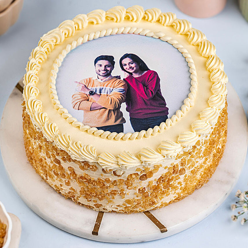 Personalised Round Shape Butterscotch Cake:Send Anniversary Cake With Photo