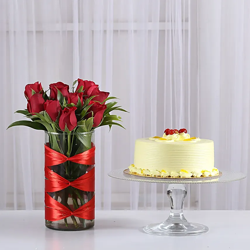 Roses n vase arrangement with cake:Cake and Flower Bouquet Delivery In Delhi