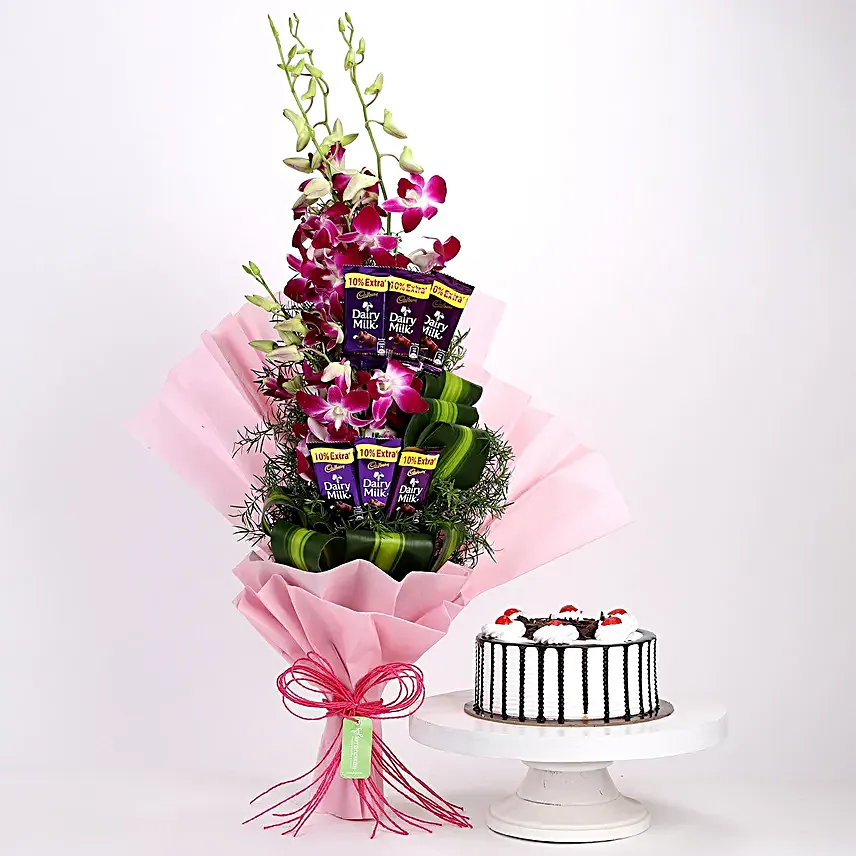 Online Dairy Milk Orchids Bouquet And Black Forest Cake:Cakes and Chocolates