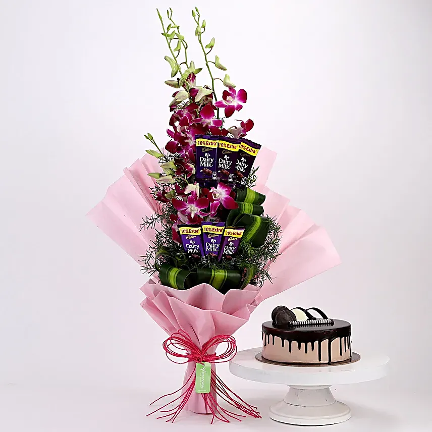 Online Dairy Milk Orchids Bouquet And Chocolate Cake:Cakes and Chocolates