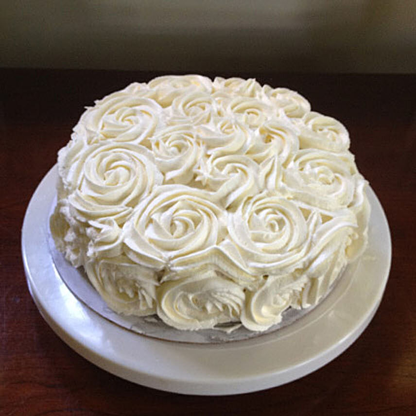 White Rose Cake Half kg:Send Gifts for 10Th Anniversary