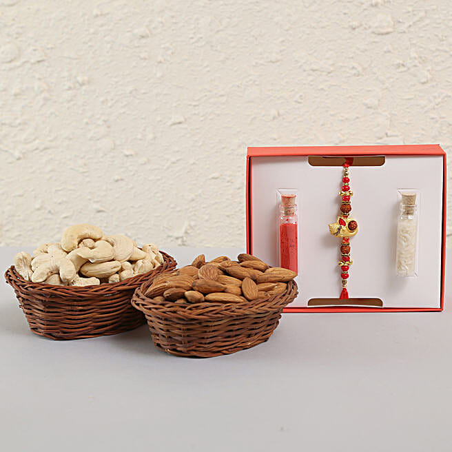 Buy/Send Ganesha Rakhi & Dry Fruits Basket Combo Online FNP