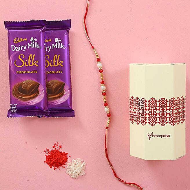 Buy/Send Pearl Rakhi & Cadbury Dairy Milk Silk Combo Online FNP