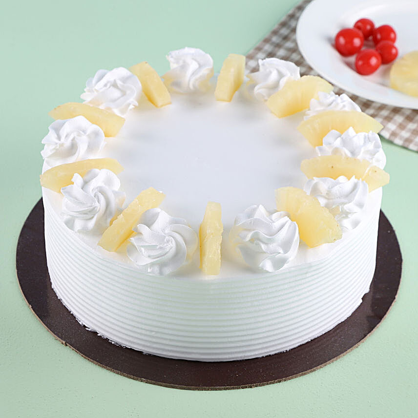 Pineapple Round Cake Half kg:Birthday Cakes Udaipur