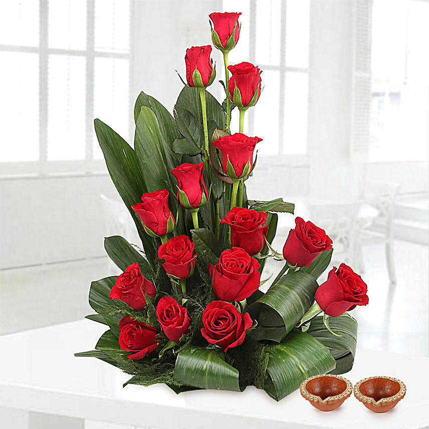 15 Red Roses & Leaves Basket Arrangement With Diyas