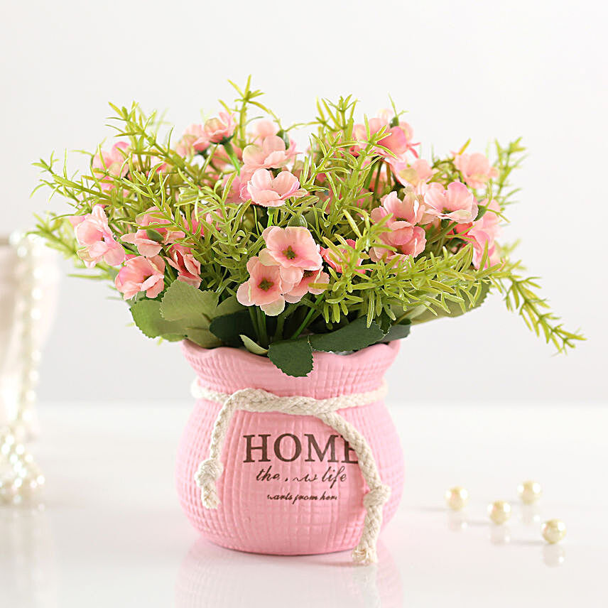 Bunch of Artificial Pink Daisies In Pink Pot