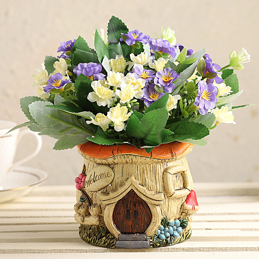 Artificial White & Blue Flowers In Resin Pot